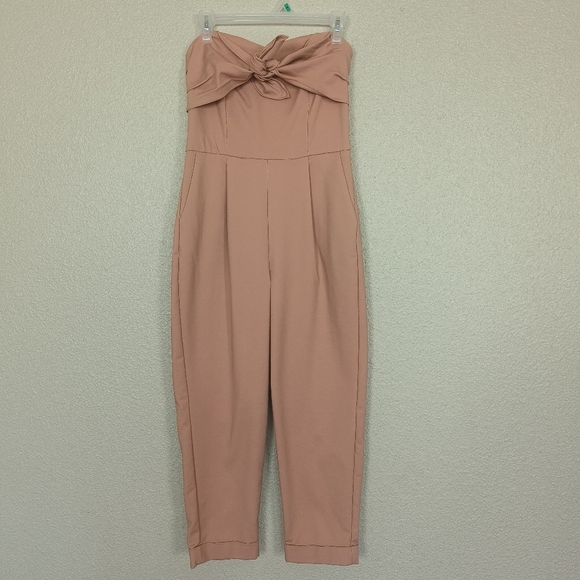 Gianni Bini Pants - Gianni Bini sleeveless low-cut jumpsuit size M bow design front pockets on the s